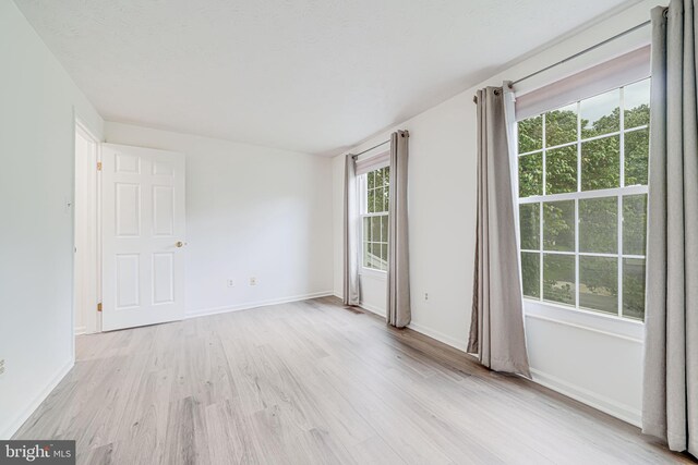 1434 Cellar Creek Way, Herndon, VA 20170 - unfurnished room with light wood-style floors and baseboards