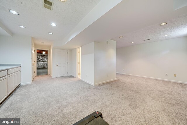 1434 Cellar Creek Way, Herndon, VA 20170 - empty room with light colored carpet, a textured ceiling, recessed lighting, and baseboards