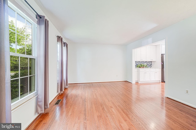 1434 Cellar Creek Way, Herndon, VA 20170 - empty room featuring light wood-style floors and baseboards