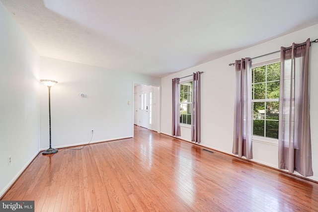 1434 Cellar Creek Way, Herndon, VA 20170 - unfurnished room with hardwood / wood-style floors, plenty of natural light, and baseboards