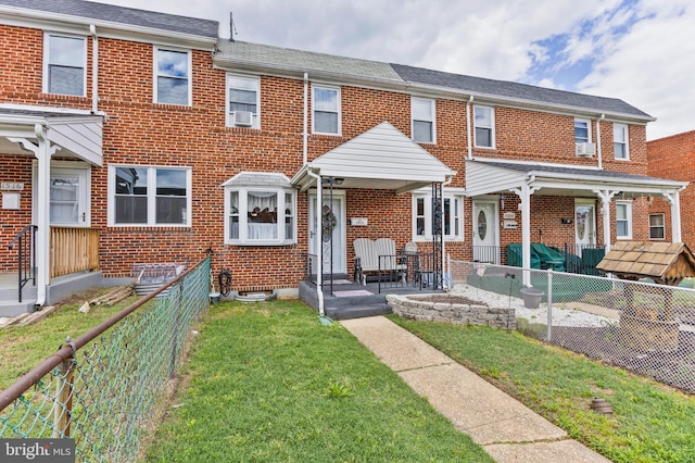 1518 Becklow Ave, Baltimore, MD 21220 - view of property featuring brick siding, cooling unit, and covered porch
