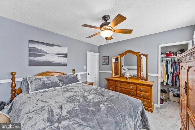 1518 Becklow Ave, Baltimore, MD 21220 - bedroom featuring a walk in closet, a closet, light colored carpet, and a ceiling fan