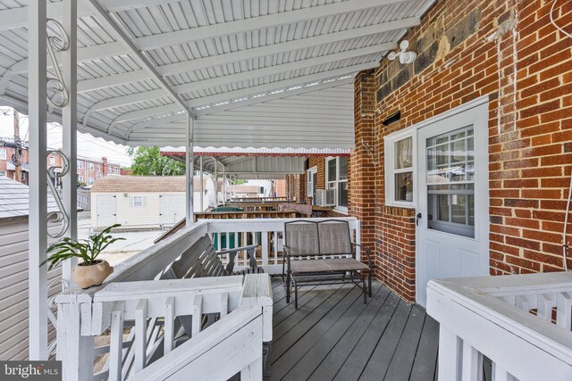 1518 Becklow Ave, Baltimore, MD 21220 - deck with an outdoor structure and cooling unit