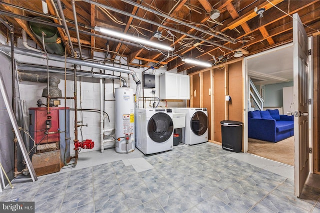 1518 Becklow Ave, Baltimore, MD 21220 - laundry room featuring washer and clothes dryer, gas water heater, cabinet space, and electric panel