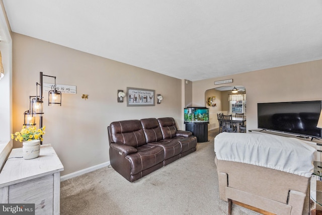 1518 Becklow Ave, Baltimore, MD 21220 - living room with carpet, baseboards, and arched walkways