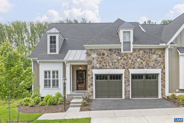 336 Avondale Ln, Crozet, VA 22932 - view of front of home with stone siding, a garage, driveway, and a shingled roof