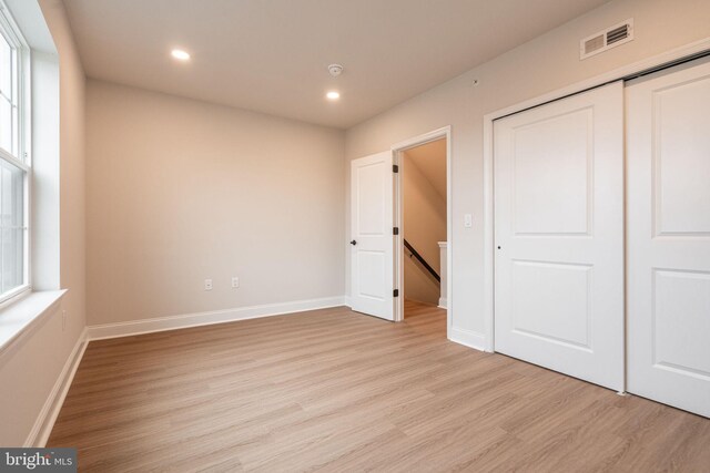 4096 Conshohocken Ave Unit A2, Philadelphia, PA 19131 - unfurnished bedroom with light wood finished floors, recessed lighting, baseboards, and a closet