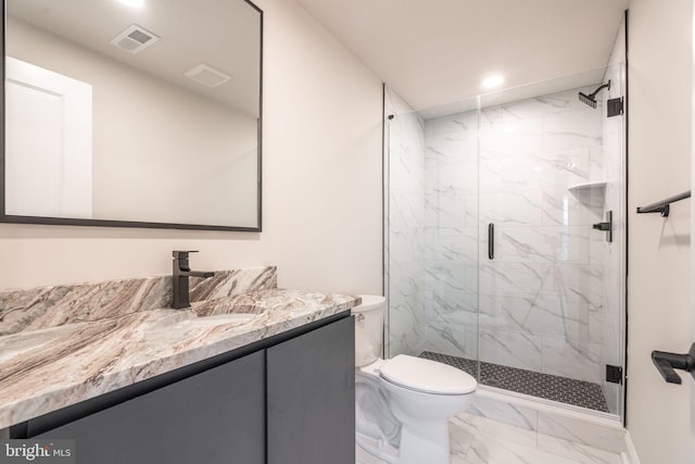 4096 Conshohocken Ave Unit A2, Philadelphia, PA 19131 - bathroom with marble finish flooring, toilet, vanity, a marble finish shower, and recessed lighting