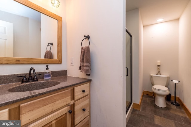 2733 Wood Ln, Morgantown, PA 19543 - bathroom featuring vanity, stone finish flooring, a shower stall, toilet, and baseboards