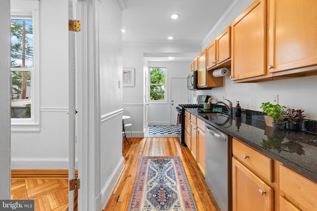 4022 Illinois Ave NW, Washington, DC 20011 - kitchen with appliances with stainless steel finishes, a sink, baseboards, dark stone counters, and recessed lighting