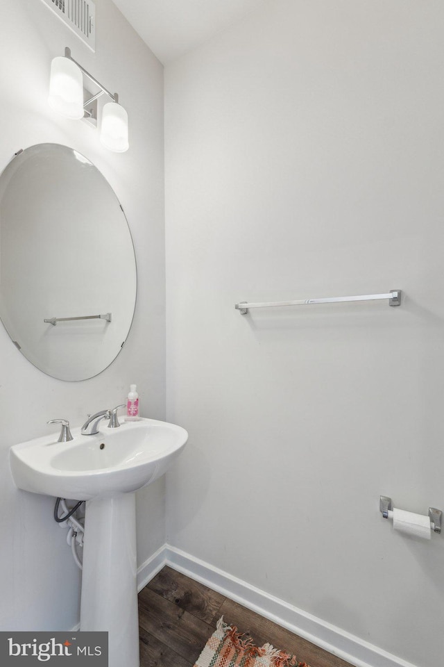 2510 Crimson Fox Dr, Hyattsville, MD 20782 - bathroom with wood finished floors and baseboards
