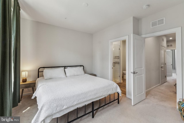 2510 Crimson Fox Dr, Hyattsville, MD 20782 - bedroom featuring light carpet, ensuite bath, and baseboards