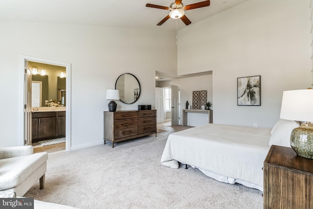 730 Aldora Dr Unit 114, Aberdeen, MD 21001 - bedroom with light colored carpet, high vaulted ceiling, baseboards, ensuite bathroom, and a ceiling fan