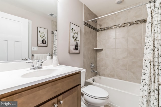 730 Aldora Dr Unit 114, Aberdeen, MD 21001 - bathroom featuring vanity, shower / tub combo with curtain, and toilet