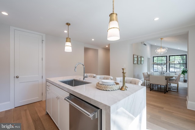 6040 Nebraska Ave NW, Washington, DC 20015 - kitchen featuring a sink, dishwasher, light wood-style flooring, decorative light fixtures, and a kitchen island with sink