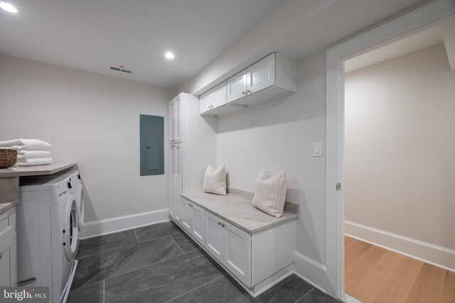 6040 Nebraska Ave NW, Washington, DC 20015 - laundry area featuring electric panel, cabinet space, washer and dryer, recessed lighting, and baseboards