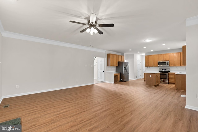 6404 Distant Melody Pl, Columbia, MD 21044 - unfurnished living room featuring crown molding, recessed lighting, baseboards, ceiling fan, and light wood finished floors