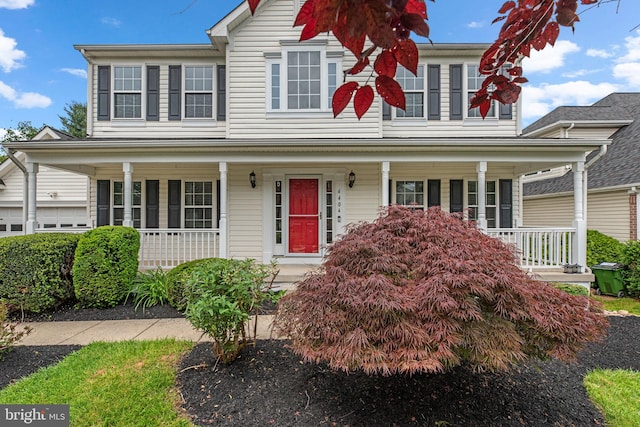 6404 Distant Melody Pl, Columbia, MD 21044 - traditional-style home with covered porch