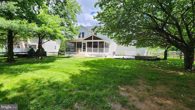 6404 Distant Melody Pl, Columbia, MD 21044 - rear view of house with a sunroom