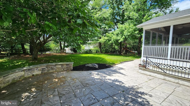 6404 Distant Melody Pl, Columbia, MD 21044 - view of patio featuring a sunroom
