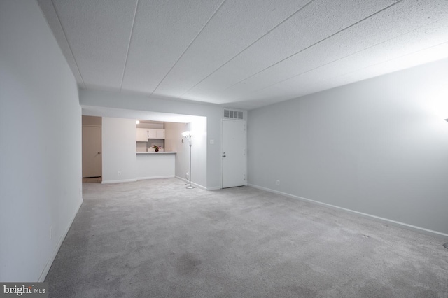 2525 Huntington Ave Unit 18, Alexandria, VA 22303 - unfurnished room with light carpet, baseboards, and a textured ceiling