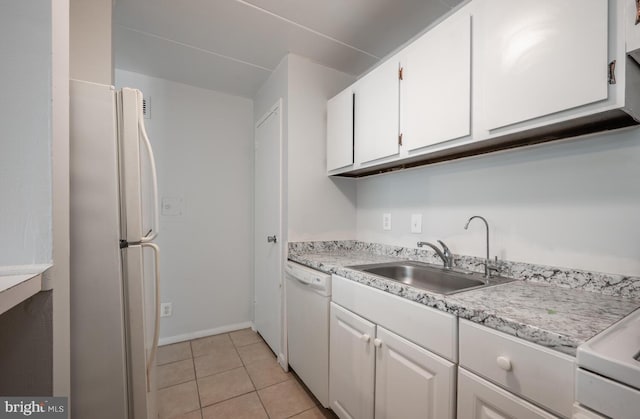 2525 Huntington Ave Unit 18, Alexandria, VA 22303 - kitchen featuring white appliances, white cabinetry, a sink, and light countertops