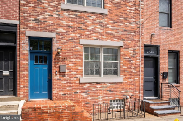 2351 E York St, Philadelphia, PA 19125 - doorway to property featuring brick siding