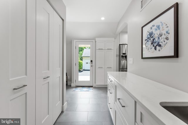 1110 Clover Hill Rd, Wynnewood, PA 19096 - corridor featuring recessed lighting and light tile patterned floors
