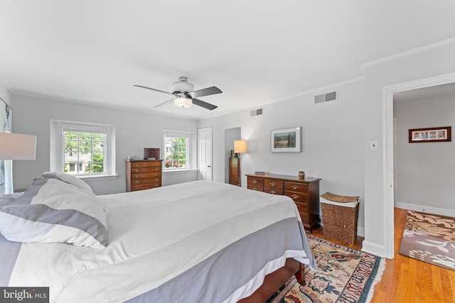 1110 Clover Hill Rd, Wynnewood, PA 19096 - bedroom featuring light wood-style flooring, ceiling fan, baseboards, and crown molding