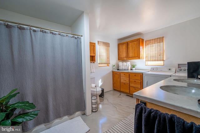 5927 Rte 6, Wellsboro, PA 16901 - full bath featuring washing machine and dryer, double vanity, a shower with curtain, and marble look tiles