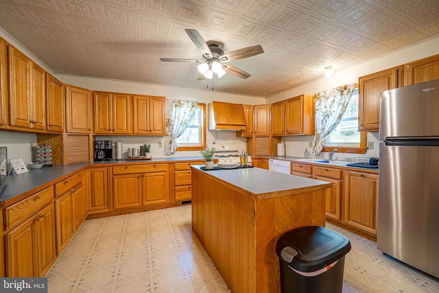 5927 Rte 6, Wellsboro, PA 16901 - kitchen with white appliances, light flooring, custom range hood, plenty of natural light, and an ornate ceiling