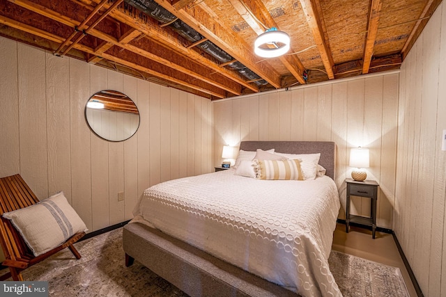 5927 Rte 6, Wellsboro, PA 16901 - bedroom featuring wooden walls and concrete flooring