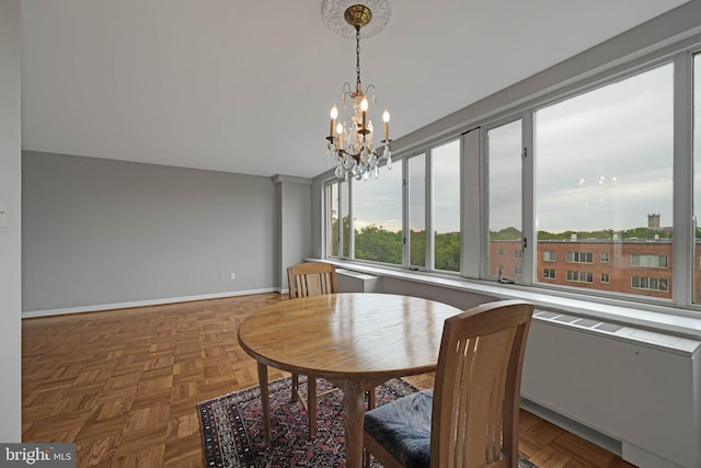 4301 Massachusetts Ave NW Unit 8009, Washington, DC 20016 - dining space featuring a chandelier and baseboards