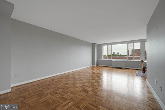 4301 Massachusetts Ave NW Unit 8009, Washington, DC 20016 - unfurnished room featuring baseboards and radiator heating unit