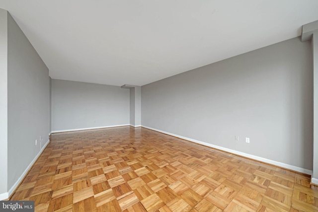 4301 Massachusetts Ave NW Unit 8009, Washington, DC 20016 - spare room featuring baseboards