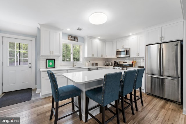 420 Conifer Dr, Forked River, NJ 08731 - kitchen with stainless steel appliances, a sink, plenty of natural light, light countertops, and recessed lighting