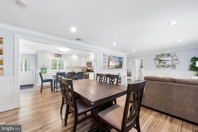420 Conifer Dr, Forked River, NJ 08731 - dining room featuring a wainscoted wall, light wood-type flooring, ornamental molding, and recessed lighting