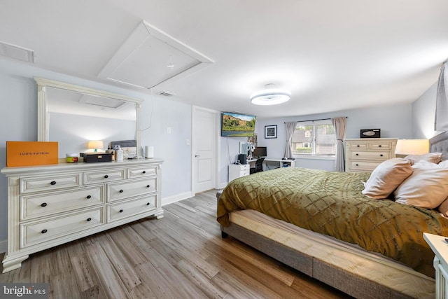 420 Conifer Dr, Forked River, NJ 08731 - bedroom with attic access, light wood-style floors, and baseboards