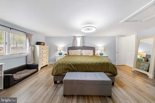 420 Conifer Dr, Forked River, NJ 08731 - bedroom with light wood-style floors and baseboards