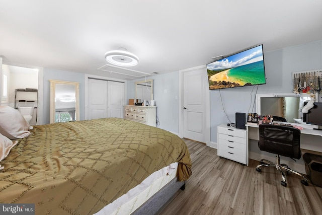 420 Conifer Dr, Forked River, NJ 08731 - bedroom featuring attic access, wood finished floors, an office area, baseboards, and a closet