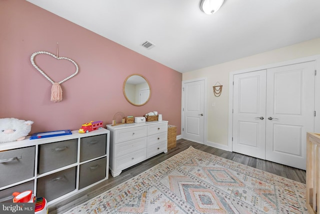 420 Conifer Dr, Forked River, NJ 08731 - bedroom with wood finished floors, baseboards, and a closet