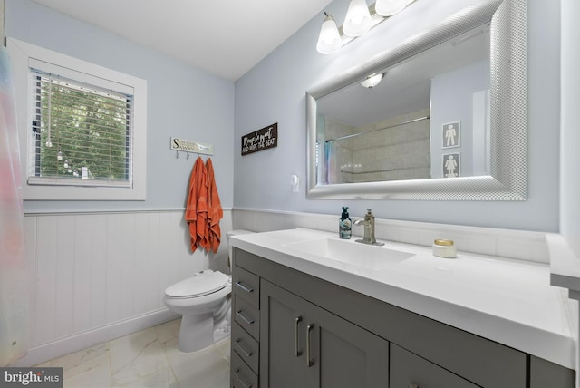 420 Conifer Dr, Forked River, NJ 08731 - bathroom with vanity, marble look tiles, toilet, wainscoting, and a shower with shower curtain