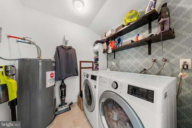 420 Conifer Dr, Forked River, NJ 08731 - laundry room with electric water heater, washer and dryer, and light tile patterned floors
