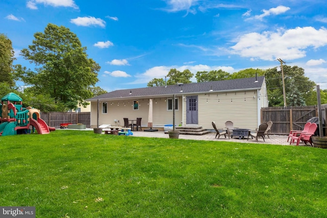 420 Conifer Dr, Forked River, NJ 08731 - back of house with an outdoor fire pit, a playground, and a patio area