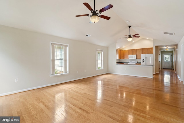 1806 Kershaw Ln, Winchester, VA 22601 - unfurnished living room with a ceiling fan, light wood-type flooring, high vaulted ceiling, and baseboards