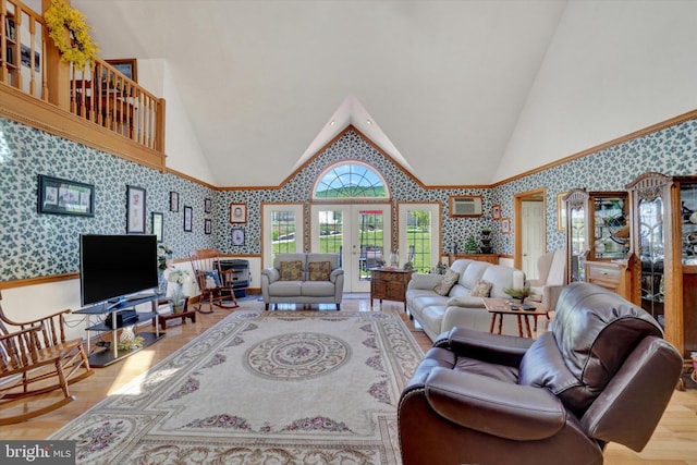 1150 S Mountain Rd, Dillsburg, PA 17019 - living area with wallpapered walls, french doors, high vaulted ceiling, wood finished floors, and a wall mounted air conditioner