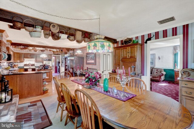 1150 S Mountain Rd, Dillsburg, PA 17019 - dining room with wallpapered walls and light carpet