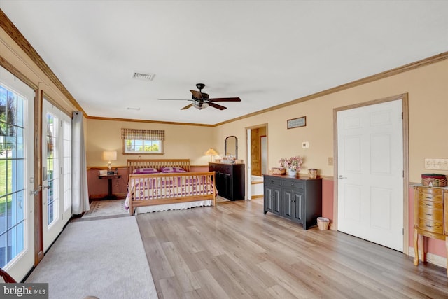 1150 S Mountain Rd, Dillsburg, PA 17019 - bedroom with light wood-type flooring, crown molding, and access to exterior