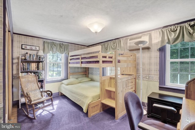 1150 S Mountain Rd, Dillsburg, PA 17019 - bedroom featuring wallpapered walls, ornamental molding, carpet floors, baseboards, and a wall mounted air conditioner