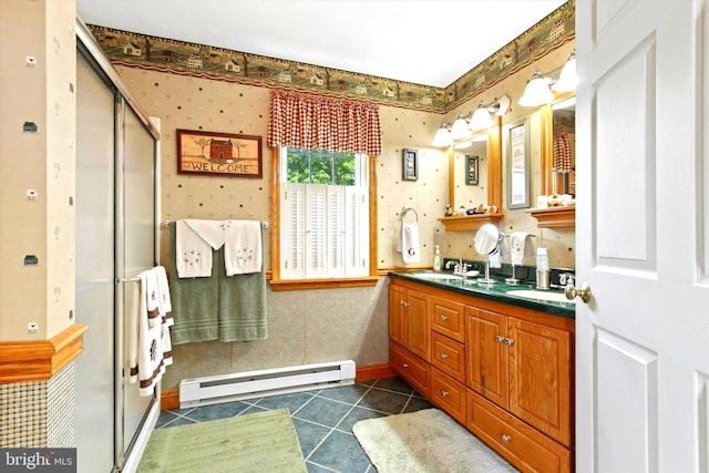 1150 S Mountain Rd, Dillsburg, PA 17019 - full bath featuring baseboard heating, wallpapered walls, double vanity, a stall shower, and tile patterned floors